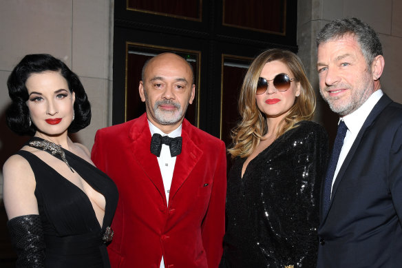  (L to R) Dita von Teese, Christian Louboutin, Melody Gardot and Jacques Bungert at the Musee Des Arts Decoratifs opening in February.