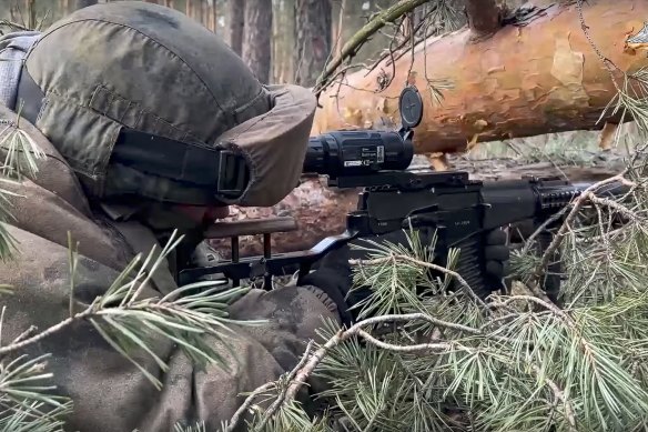 A Russian soldier prepares to fire on Ukrainian troops. 