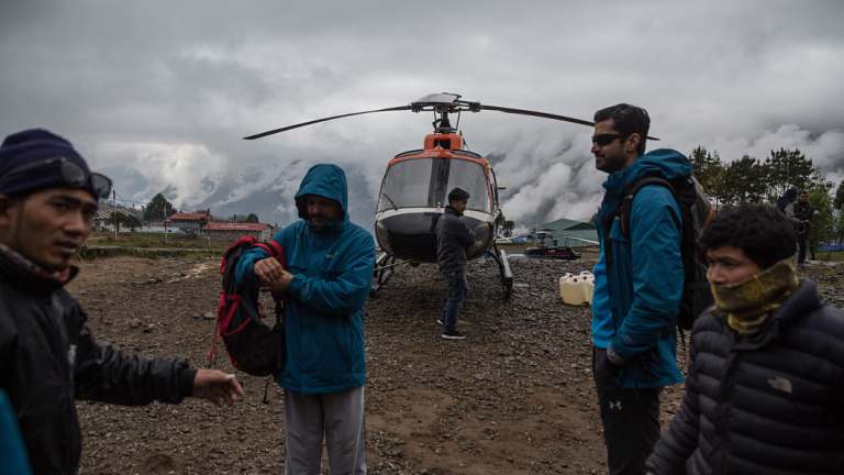 Trekkers at the airport in Lukla, Nepal before beginning their trek to the Everest base camp in May.