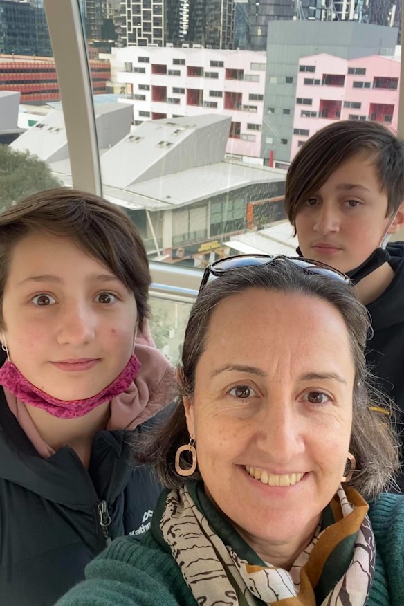 Leah Cripps with her daughter Tully Cripps, 11, and son Harry Cripps,13, riding the Melbourne Star last school holidays. 