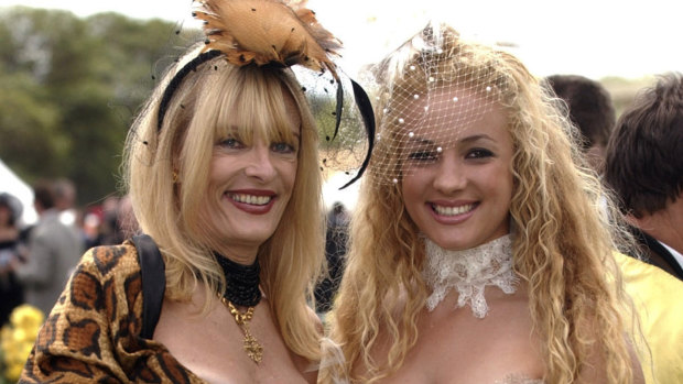 Maureen Boyce (left) with her daughter, Angelique, pictured at the 2002 Melbourne Cup.