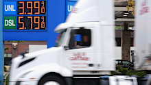  A truck drives past  a Minneapolis fuel station as diesel prices hit a record high in the US, on September 4.