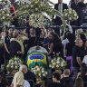 ‘Pele is our king’: Huge crowds bid soccer legend farewell in Santos