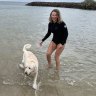 Kate Halfpenny with husband Chris, their Groodle Maggie and a local canine friend.