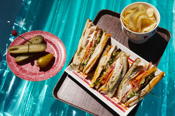 Garlic-buttered bread sends the flavour of this club sandwich soaring.