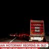 A crime scene on the Logan Motorway had trucks and cars waiting hours to pass through after a man was struck by a vehicle. Photo: Nine News, Twitter