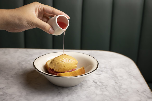 Rum baba with rhubarb is one of many European touches on the menu.