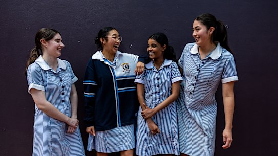 It’s over: HSC students Rebecca Price, Rhiannon Trang, Tamika  Rodrigo and Sarah Johnston relax following their final year 12 Higher School Certificate (HSC) exam at Mercy College in Chatswood.