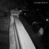 Screenshot from CCTV footage shows a person leaving the vicinity of the 5G tower shortly before a blast.