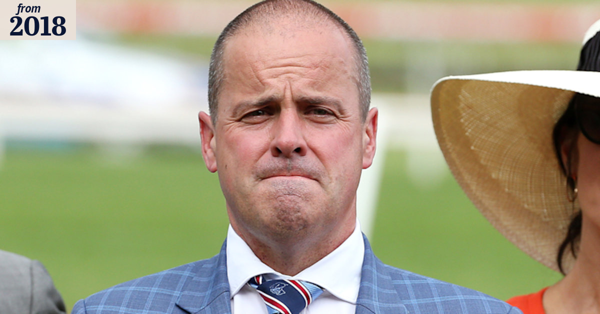 Mike Symons defends his position with Melbourne Racing Club
