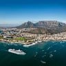 The cruise ship Norwegian Dawn passes along the spectacular coastline and peaks of Cape Town., South Africa.