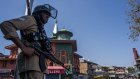An Indian paramilitary trooper stands guard in Srinagar after Modi announced the revocation of Indian-administered Kashmir’s autonomous status.