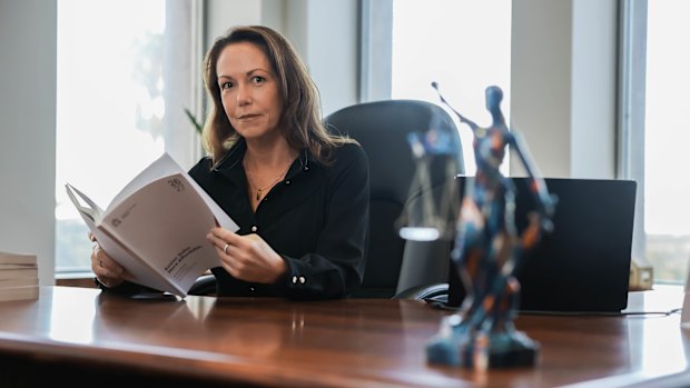 Victorian Treasurer Jaclyn Symes in her office with the 2026-27 budget papers.