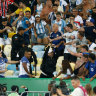 Violent clash between police, fans delays Brazil-Argentina clash