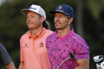 Cameron Smith, left, and actor Mark Wahlberg during the Sony Open tournament pro-am event on Wednesday.