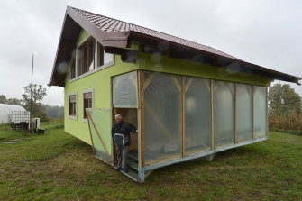 Kusic built the house to spin after twice reorienting the family home. 