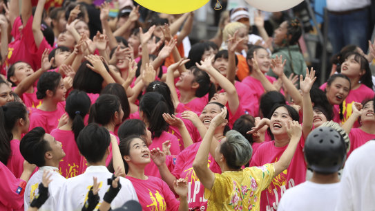 Dancers cheer during the National Day celebrations in Taipei.