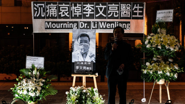 People attend a vigil to mourn for doctor Li Wenliang in Hong Kong, China. 