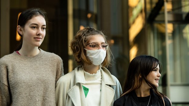 Laura Kirwan, 17, Ava Princi, 17 and Izzy Raj-Seppings, 14, who are among the eight students who sought to have Environment Minister Sussan Ley blocked from approving a coal mine due to climate impacts.