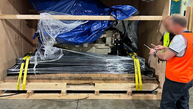 Police said they found the plastic-wrapped drug bricks inside boat engines being delivered from California.
