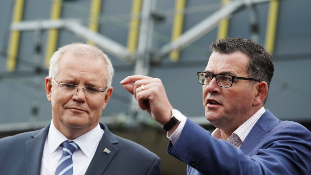 Prime Minister Scott Morrison and Victorian Premier Daniel Andrews speak at Sunshine train station.