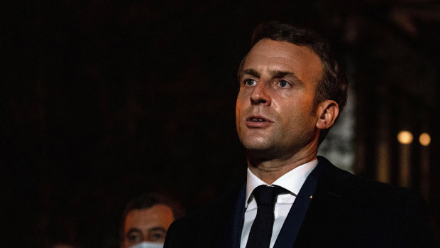 President Emmanuel Macron spoke on Friday at the high school north-west of Paris.  Teacher Samuel Paty was beheaded on Friday for showing a Charlie Hebdo caricature of the prophet to his class. 