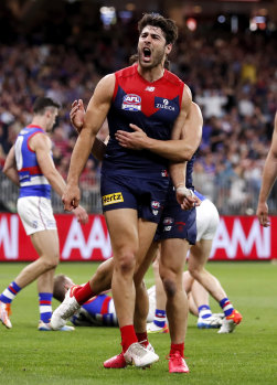 Petracca celebrates a goal.