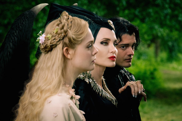 Keeping it in the family: Elle Fanning as Aurora, Angelina Jolie as Maleficent and Sam Riley as the raven Diaval in Maleficent: Mistress of Evil.