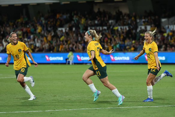 Ellie Carpenter celebrates after scoring for the Matildas.