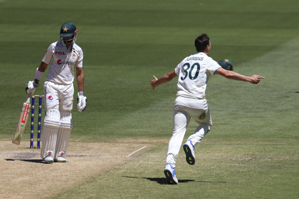 Pat Cummins celebrates after dismissing Pakistan’s Shan Masood on Friday.