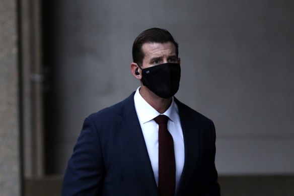 Ben Roberts-Smith arrives at the Federal Court in Sydney on Wednesday. Masks are now compulsory in the courtroom.