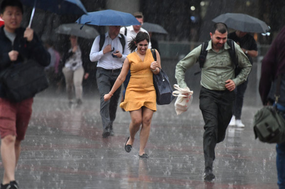 Office workers caught in the downpour on Wednesday afternoon.