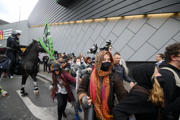 Protesters outside the Melbourne Convention and Exhibition Centre.