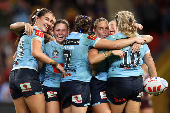 The Sky Blues celebrate their game one victory.