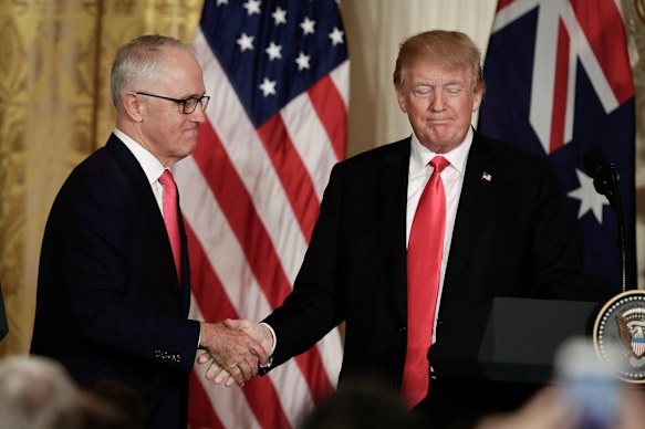 Then-prime minister Malcolm Turnbull and US President Donald Trump shake hands at a joint press conference at the White House in 2018.