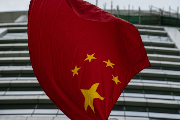 Chinese flag flies outside the Office for Safeguarding National Security of the Central People's Government in the Hong Kong.