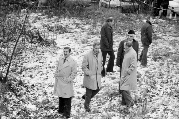 Hobson (left), head of the Ripper Squad, discussing the case at the scene of a killing in Leeds.