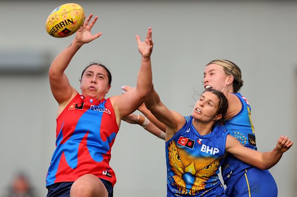 Alyssia Pisano of the Demons contests for a mark.