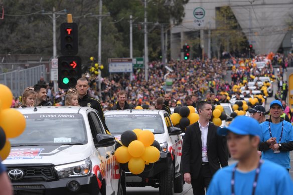 Trent Cotchin and Dustin Martin lead the Richmond cavalcade along a parade route that was, mostly, a sea of yellow and black.