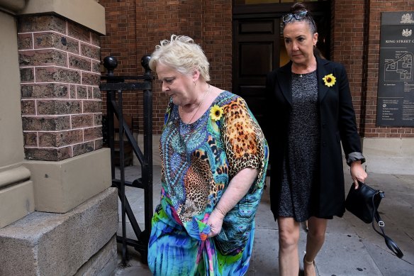 Joanne Dunn (left), the mother of Michaela Dunn, leaves the Supreme Court after hearing Mert Ney give evidence on Tuesday. 