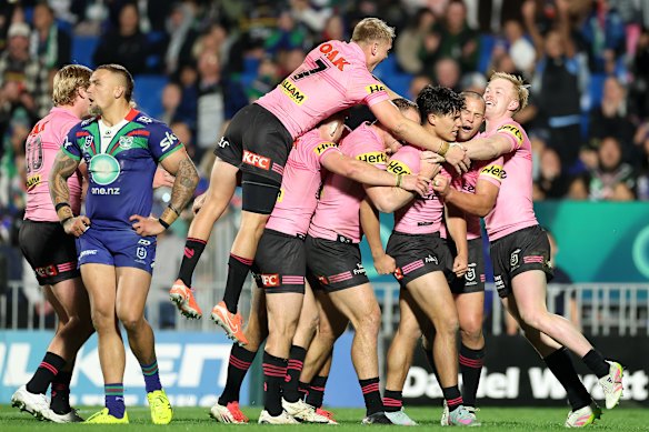 The Panthers celebrate a Blaize Talagi try.