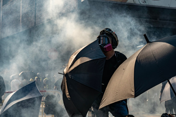Some protesters wear face masks to protect themselves from tear gas, others are trying to conceal their identity.