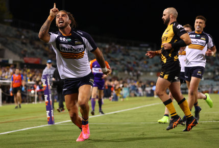 Andy Muirhead celebrates a Brumbies try against the Force on Friday night.