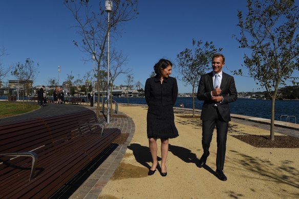 Premier Gladys Berejiklian and Planning and Public Spaces Minister Rob Stokes open the final piece of the foreshore walk at Barangaroo.