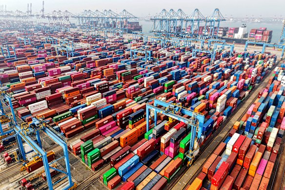 Trucks and shipping containers in Qingdao, China, in June. The Dubai Tower is carrying 1300 containers from there.