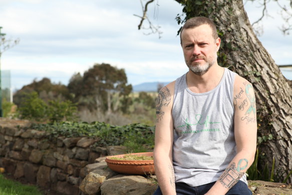 Author Dean Yates at home in Tasmania in 2019, after seeking help for his volatile moods.
