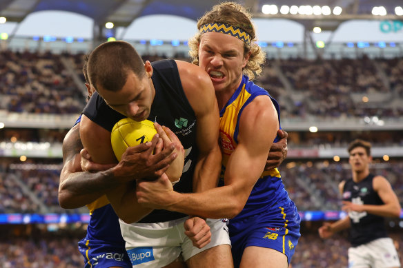 Jayden Hunt tackles Brodie Kemp. 