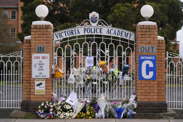 Flowers at the gates of the Victoria Police Academy on Thursday.