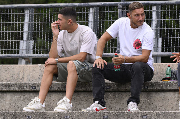 Cristian Volpato with Francesco Totti, his agent.