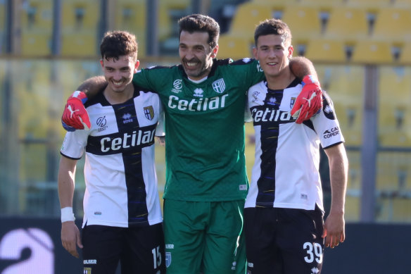 Alessandro Circati (right) with Italian legend Gianluigi Buffon, who is still playing for Parma at 44 years old.